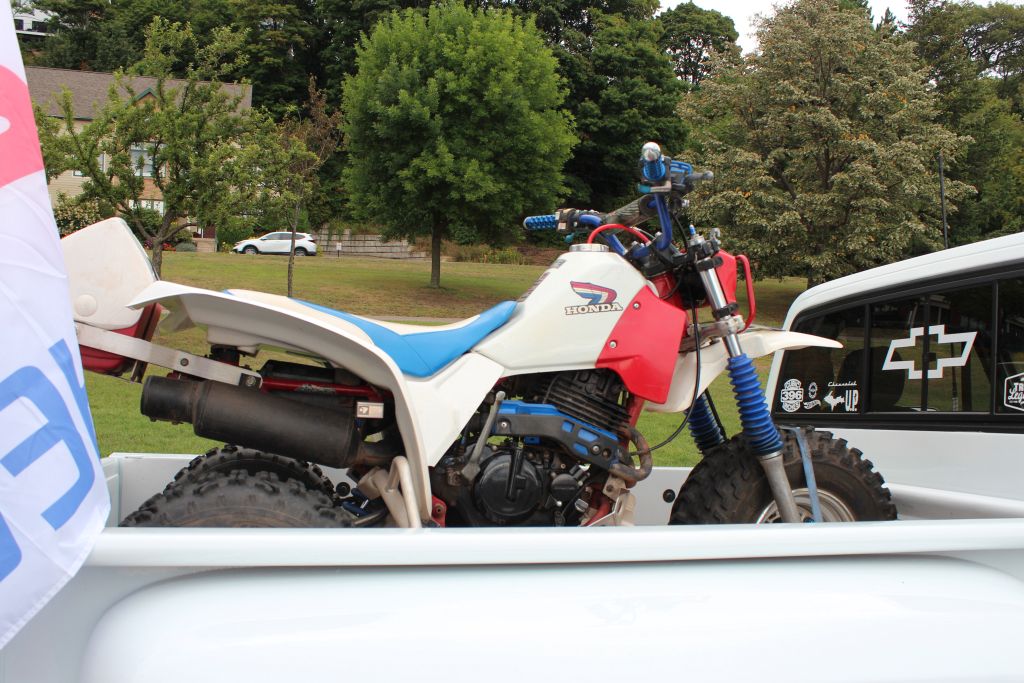 A classic, red white and blue Honda three-wheeler