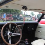 The interior of the white Pontiac Firebird