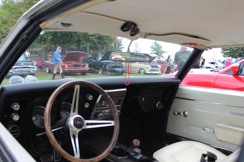The interior of the white Pontiac Firebird