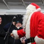 Todd Noordyk welcomes Santa to the stage