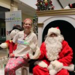 Our very own Abbie helped Santa with all the kids