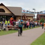 More racers flood into the Marquette Commons for the Iron Range Roll